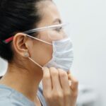 photo of woman wearing protective mask