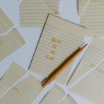a pen on a notepad with a quote